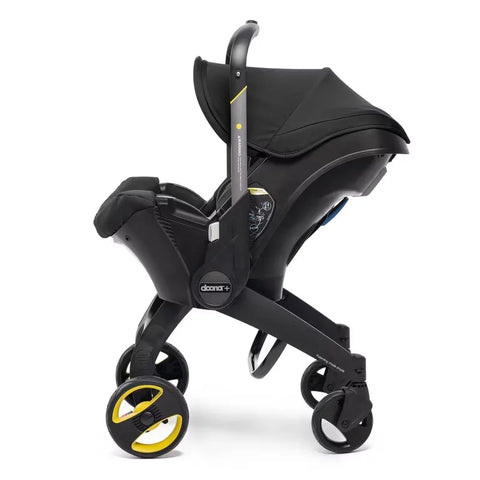 Doona Car Seat + Latch Base Travel System - Nitro Black: Rubber Tires, Aluminum Frame, Minimum Weight 4 Lbs, Weight 10 Lbs