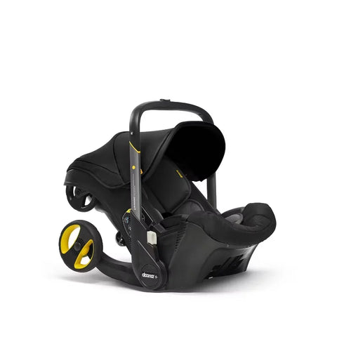 Doona Car Seat + Latch Base Travel System - Nitro Black: Rubber Tires, Aluminum Frame, Minimum Weight 4 Lbs, Weight 10 Lbs