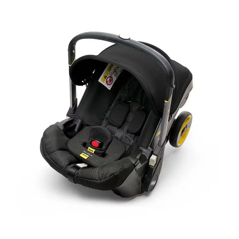 Doona Ultimate Peace of Mind Bundle Travel System - Black: 5-Point Harness, Rubber Tires, Rear Facing Seat