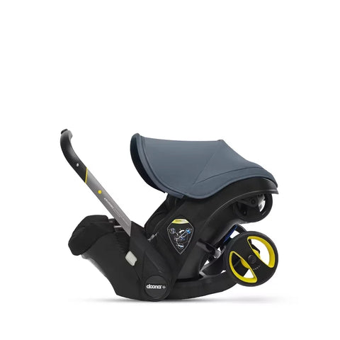 Doona Car Seat + Latch Base Travel System - Nitro Black: Rubber Tires, Aluminum Frame, Minimum Weight 4 Lbs, Weight 10 Lbs
