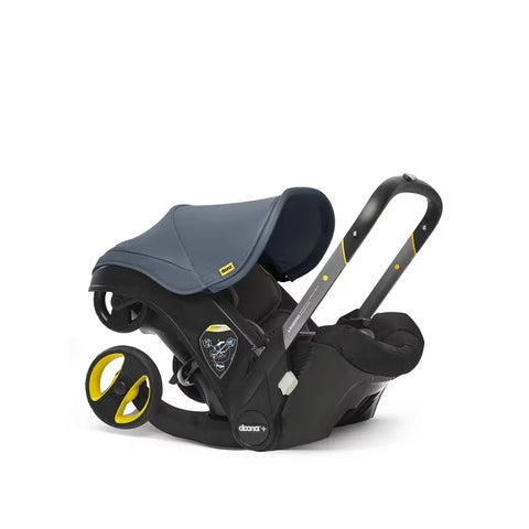 Doona Car Seat + Latch Base Travel System - Nitro Black: Rubber Tires, Aluminum Frame, Minimum Weight 4 Lbs, Weight 10 Lbs