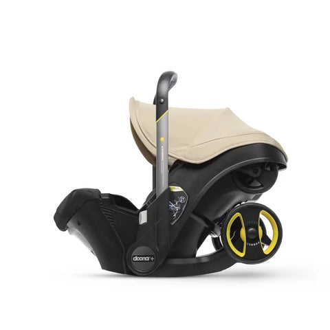Doona Car Seat + Latch Base Travel System - Nitro Black: Rubber Tires, Aluminum Frame, Minimum Weight 4 Lbs, Weight 10 Lbs