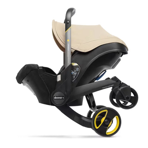 Doona Car Seat + Latch Base Travel System - Nitro Black: Rubber Tires, Aluminum Frame, Minimum Weight 4 Lbs, Weight 10 Lbs