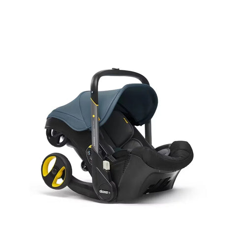 Doona Car Seat + Latch Base Travel System - Nitro Black: Rubber Tires, Aluminum Frame, Minimum Weight 4 Lbs, Weight 10 Lbs