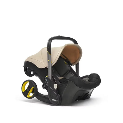 Doona Car Seat + Latch Base Travel System - Nitro Black: Rubber Tires, Aluminum Frame, Minimum Weight 4 Lbs, Weight 10 Lbs