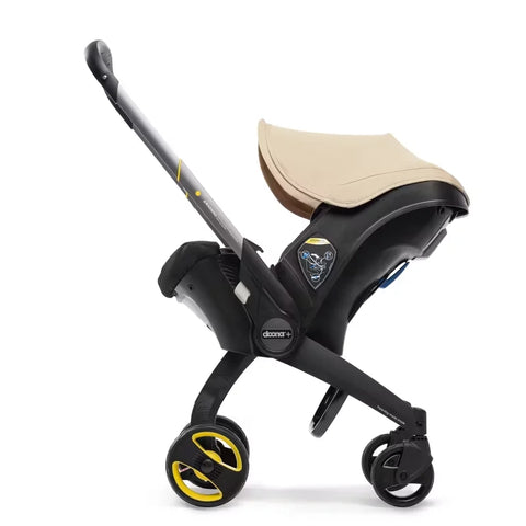 Doona Car Seat + Latch Base Travel System - Nitro Black: Rubber Tires, Aluminum Frame, Minimum Weight 4 Lbs, Weight 10 Lbs