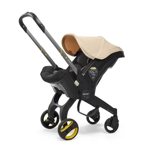 Doona Car Seat + Latch Base Travel System - Nitro Black: Rubber Tires, Aluminum Frame, Minimum Weight 4 Lbs, Weight 10 Lbs