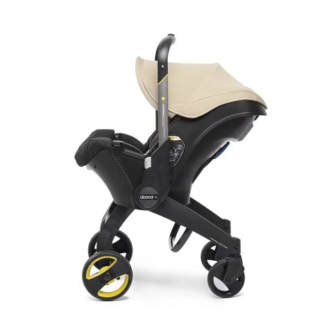 Doona Car Seat + Latch Base Travel System - Nitro Black: Rubber Tires, Aluminum Frame, Minimum Weight 4 Lbs, Weight 10 Lbs