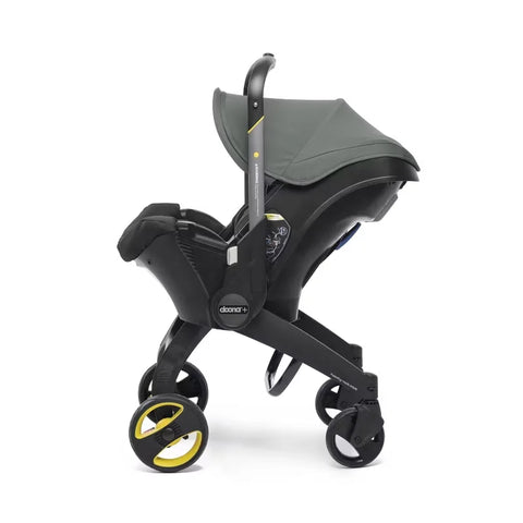 Doona Car Seat + Latch Base Travel System - Nitro Black: Rubber Tires, Aluminum Frame, Minimum Weight 4 Lbs, Weight 10 Lbs
