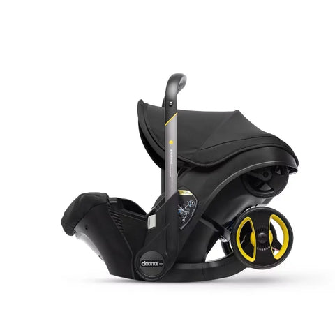 Doona Car Seat + Latch Base Travel System - Nitro Black: Rubber Tires, Aluminum Frame, Minimum Weight 4 Lbs, Weight 10 Lbs