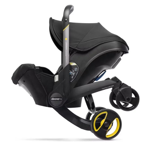 Doona Car Seat + Latch Base Travel System - Nitro Black: Rubber Tires, Aluminum Frame, Minimum Weight 4 Lbs, Weight 10 Lbs