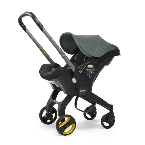 Doona Car Seat + Latch Base Travel System - Nitro Black: Rubber Tires, Aluminum Frame, Minimum Weight 4 Lbs, Weight 10 Lbs