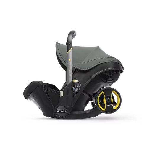 Doona Car Seat + Latch Base Travel System - Nitro Black: Rubber Tires, Aluminum Frame, Minimum Weight 4 Lbs, Weight 10 Lbs