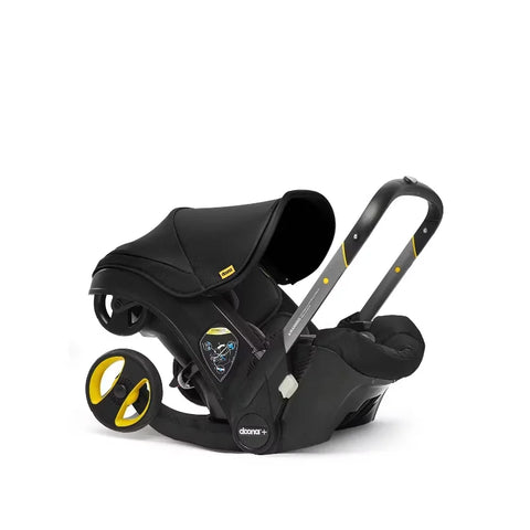 Doona Car Seat + Latch Base Travel System - Nitro Black: Rubber Tires, Aluminum Frame, Minimum Weight 4 Lbs, Weight 10 Lbs