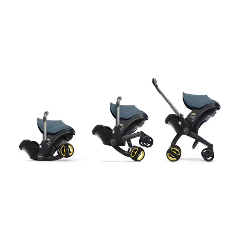 Doona Car Seat + Latch Base Travel System - Nitro Black: Rubber Tires, Aluminum Frame, Minimum Weight 4 Lbs, Weight 10 Lbs